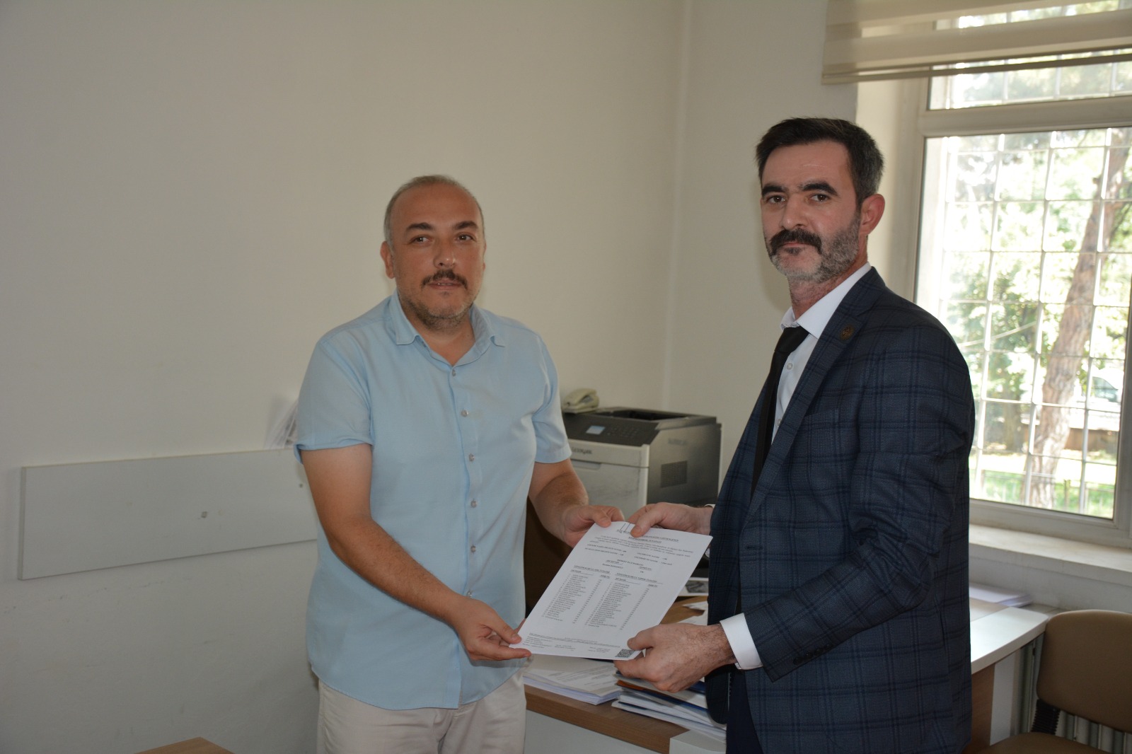 MHP'Lİ DANAOĞLU MAZBATASINI ALDI