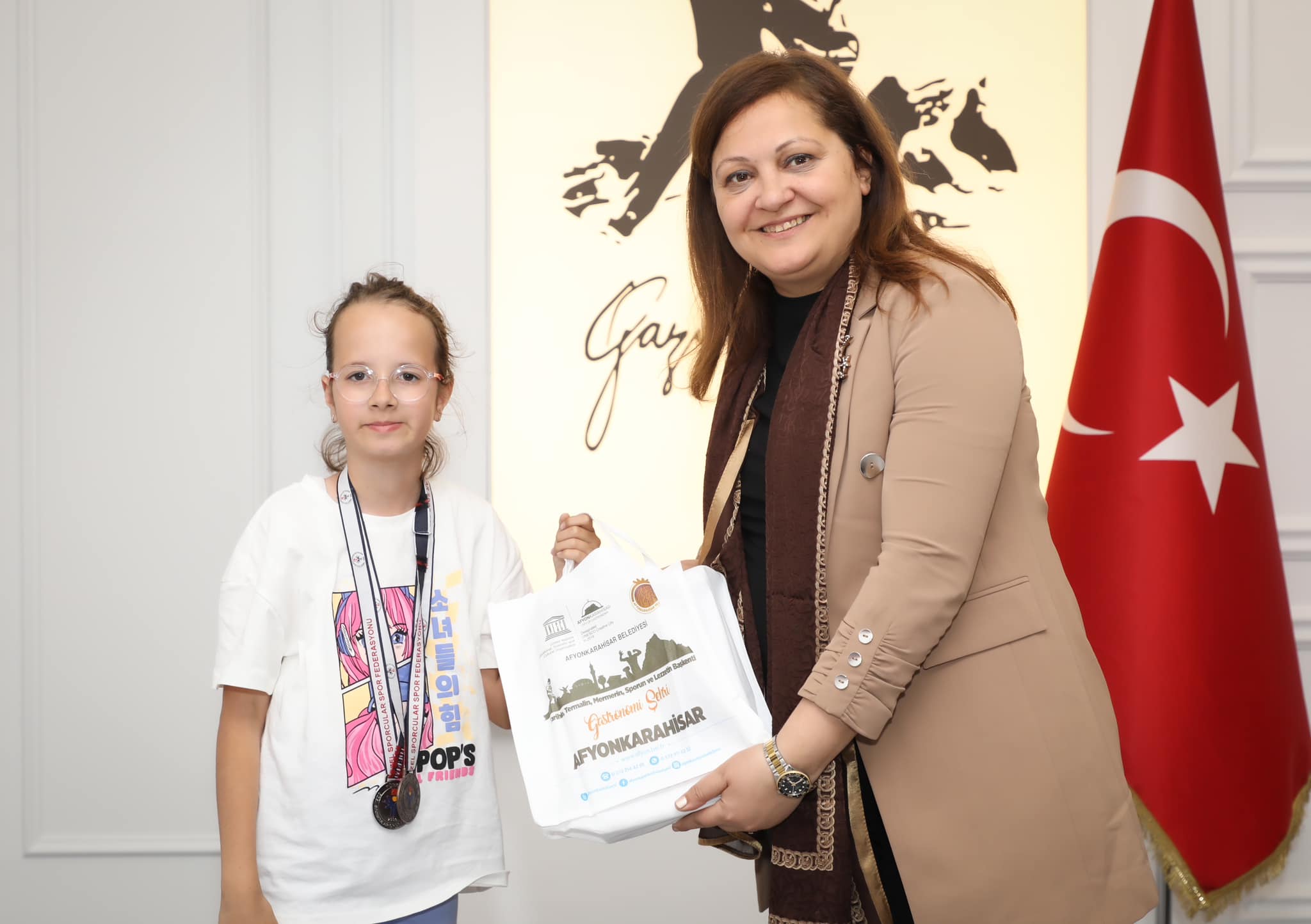 BAŞKAN KÖKSAL AFYONLU ŞAMPİYONLARI KONUK ETTİ