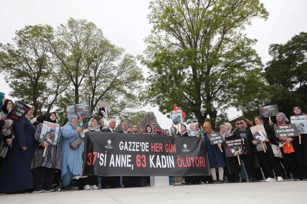 "KANLI ELLERİNİZİ SİVİLLERİN ÜZERİNDEN ÇEKİN"