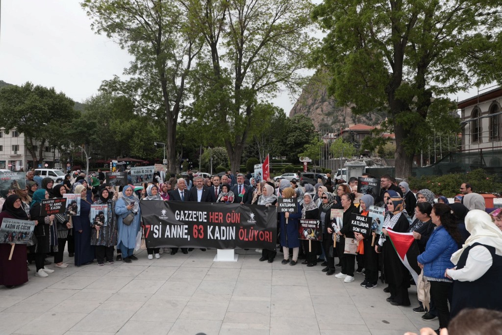 "KANLI ELLERİNİZİ SİVİLLERİN ÜZERİNDEN ÇEKİN"