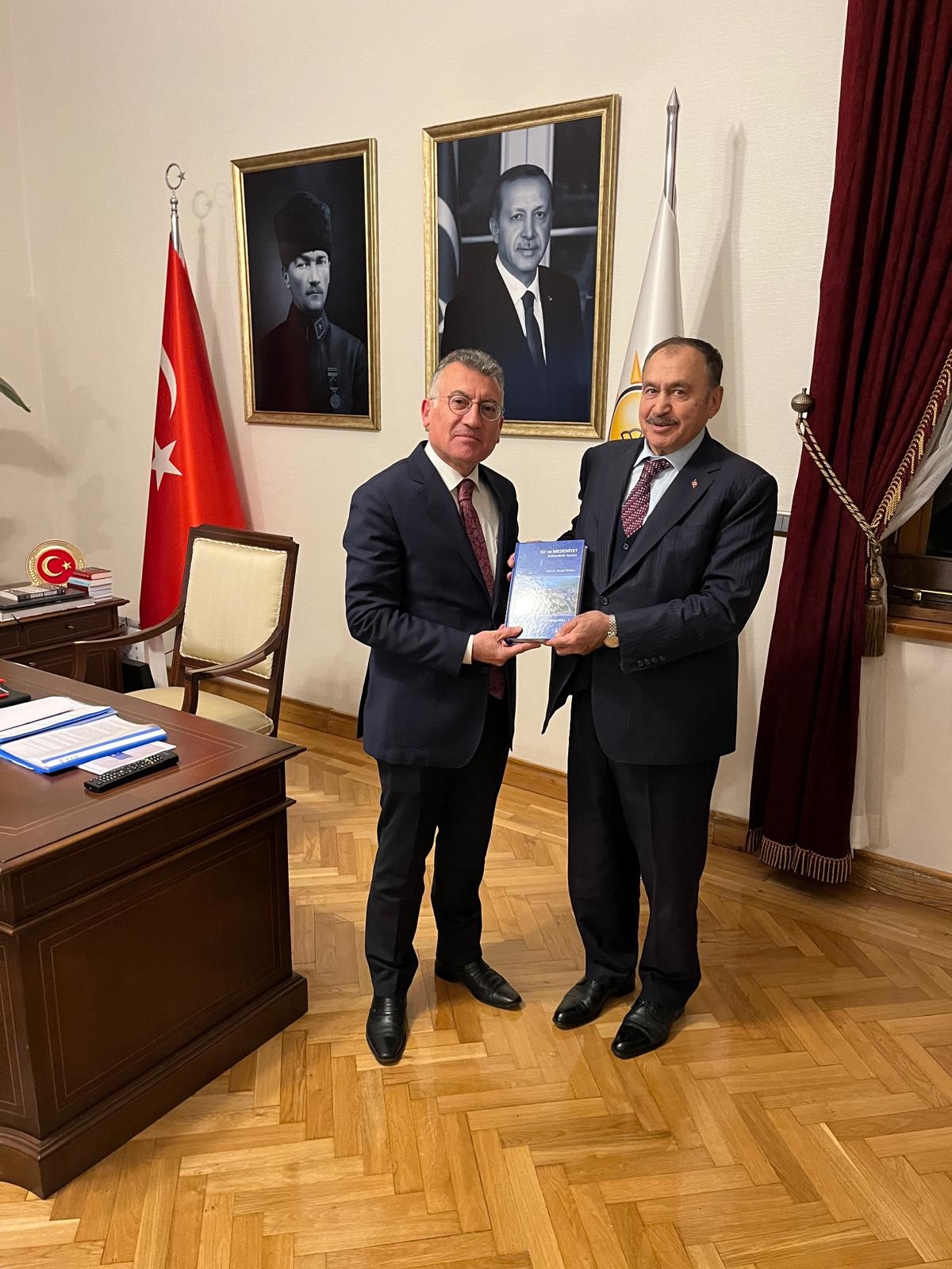 Prof. Dr. Eroğlu,  AK Parti Grup Başkanı Güler’e Kitabını Hediye Etti!