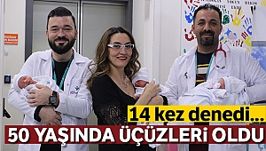 50 yaşında üçüzleri kucağına aldı
