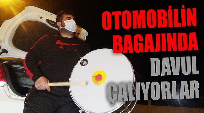 OTOMOBİLİN BAGAJINDA DAVUL ÇALIYORLAR