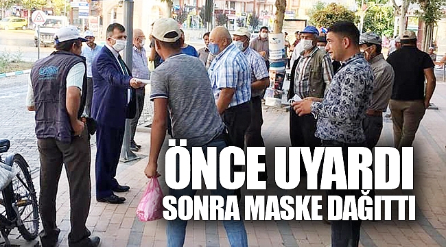 ÖNCE UYARDI, SONRA MASKE DAĞITTI