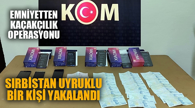 KAÇAK TELEFON SATICISI YAKALANDI