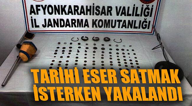 ELİNDEKİ TARİHİ ESERLERİ SATMAK İSTERKEN YAKALANDI