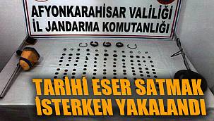 ELİNDEKİ TARİHİ ESERLERİ SATMAK İSTERKEN YAKALANDI