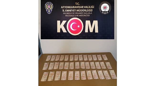 Sahte parayla cep telefonu satın aldı