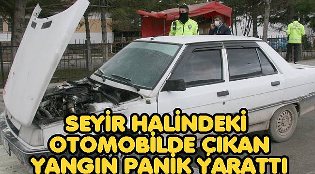 SEYİR HALİNDEKİ OTOMOBİLDE ÇIKAN YANGIN PANİK YARATTI