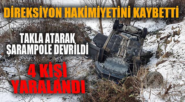 Takla atan otomobilde 4 kişi yaralandı 