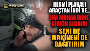Resmi plakalı araçtan inip İHA muhabirine saldırdı 