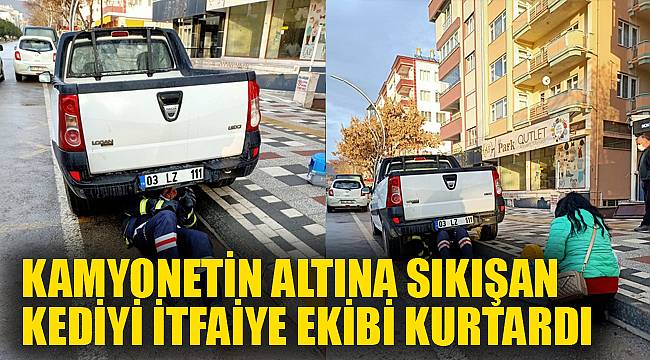 Kamyonetin altına sıkışan kediyi itfaiye ekibi kurtardı