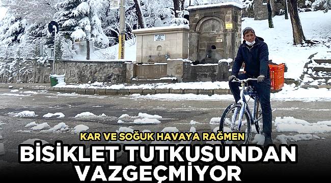 KAR VE SOĞUK HAVAYA RAĞMEN BİSİKLET TUTKUSUNDAN VAZGEÇMİYOR
