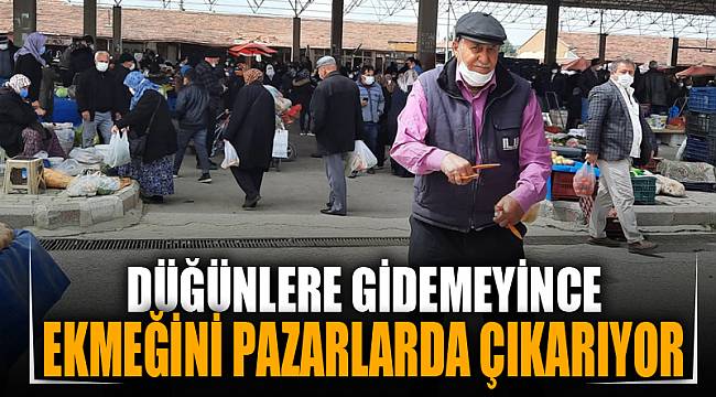 Düğünlere gidemeyince ekmeğini pazarlarda oynayarak çıkartıyor 