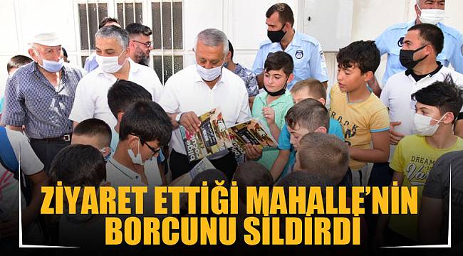 ZİYARET ETTİĞİ MAHALLE’NİN BORCUNU SİLDİRDİ