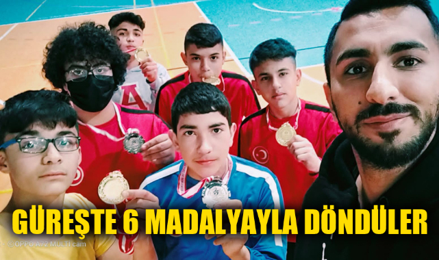 GÜREŞTE 6 MADALYAYLA DÖNDÜLER