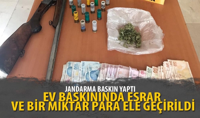 AFYONDAKİ EV BASKININDA ESRAR VE BİR MİKTAR PARA ELE GEÇİRİLDİ