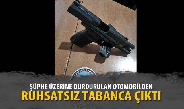 ŞÜPHE ÜZERİNE DURDURULAN OTOMOBİLDEN RUHSATSIZ TABANCA ÇIKTI