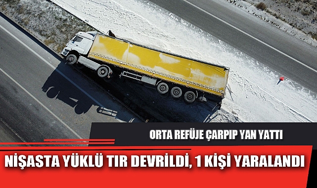 NİŞASTA YÜKLÜ TIR DEVRİLDİ, 1 KİŞİ YARALANDI