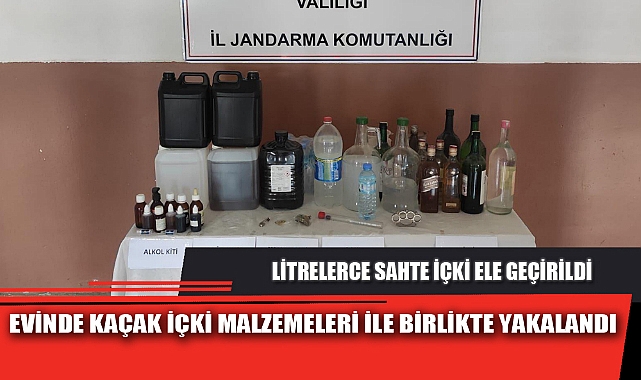 EVİNDE KAÇAK İÇKİ MALZEMELERİ İLE BİRLİKTE YAKALANDI