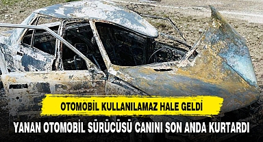 YANAN OTOMOBİL SÜRÜCÜSÜ CANINI SON ANDA KURTARDI