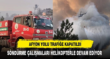 AFYON YOLU TRAFİĞE KAPATILDI YANGINA HELİKOPTERLE MÜDAHALE EDİLİYOR
