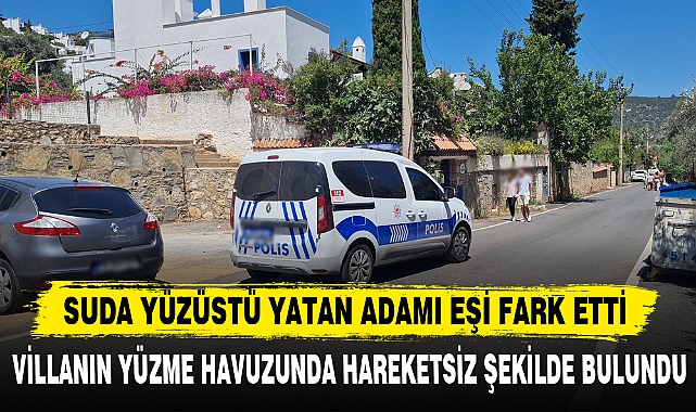 SUDA YÜZÜSTÜ YATAN ADAMI EŞİ FARK ETTİ