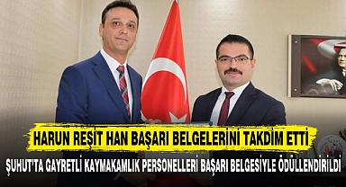 HARUN REŞİT HAN BAŞARI BELGELERİNİ TAKDİM ETTİ
