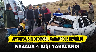 AFYON'DA BİR OTOMOBİL ŞARAMPOLE DEVRİLDİ