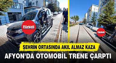 AFYON'DA OTOMOBİL TRENE ÇARPTI