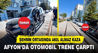 AFYON'DA OTOMOBİL TRENE ÇARPTI