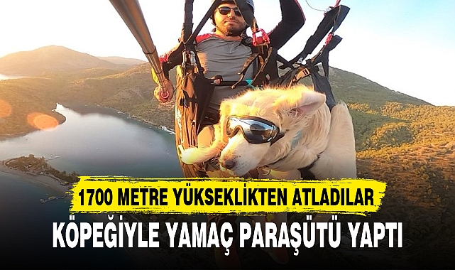 KÖPEĞİYLE YAMAÇ PARAŞÜTÜ YAPTI