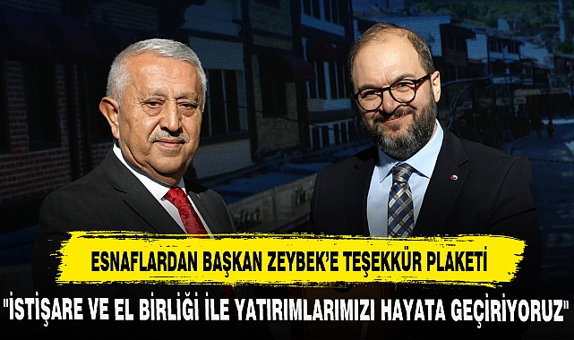 ESNAFLARDAN BAŞKAN ZEYBEK'E TEŞEKKÜR PLAKETİ