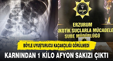 KARNINDAN 1 KİLO AFYON SAKIZI ÇIKTI