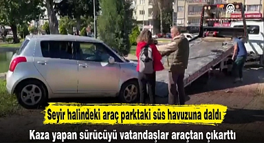 Seyir halindeki araç parktaki süs havuzuna daldı