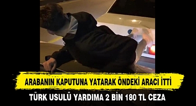 ARABANIN KAPUTUNA YATARAK ÖNDEKİ ARACI İTTİ