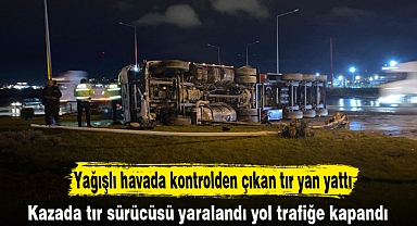 Yağışlı havada kontrolden çıkan tır yan yattı