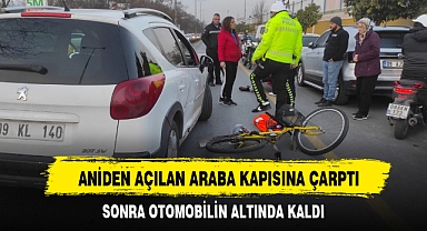 ANİDEN AÇILAN ARABA KAPISINA ÇARPTI
