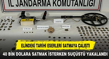 ELİNDEKİ TARİHİ ESERLERİ SATMAYA ÇALIŞTI