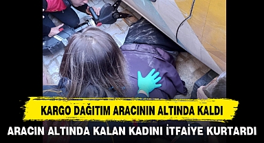 KARGO DAĞITIM ARACININ ALTINDA KALDI