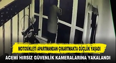 MOTOSİKLETİ APARTMANDAN ÇIKARTMAKTA GÜÇLÜK YAŞADI