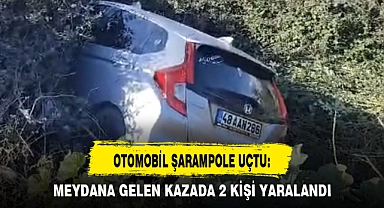 OTOMOBİL ŞARAMPOLE UÇTU: