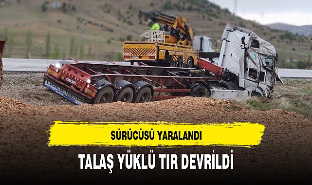TALAŞ YÜKLÜ TIR DEVRİLDİ, SÜRÜCÜSÜ YARALANDI