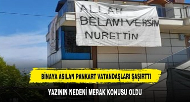 Binaya asılan "Allah belanı versin Nurettin" yazılı pankart vatandaşları şaşırttı