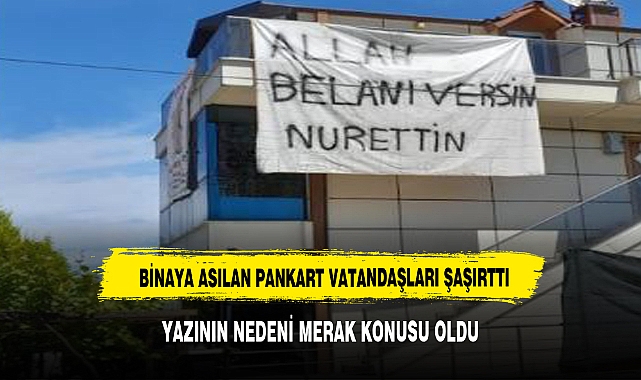 Binaya asılan "Allah belanı versin Nurettin" yazılı pankart vatandaşları şaşırttı