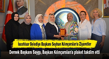 Dernek Başkanı Saygı, Başkan Kılınçarslan'a plaket takdim etti