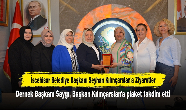 Dernek Başkanı Saygı, Başkan Kılınçarslan'a plaket takdim etti