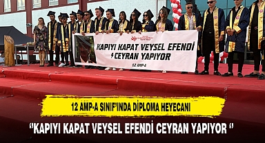 12 AMP-A Mezun Oldu Ellerindeki Pankart Dikkat Çekti