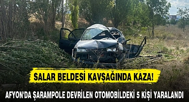 AFYON'DA ŞARAMPOLE DEVRİLEN OTOMOBİLDEKİ 5 KİŞİ YARALANDI