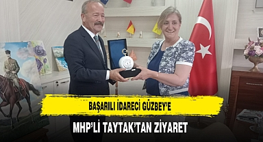 Başarılı İdareci Güzbey'e MHP'li Taytak'tan Ziyaret